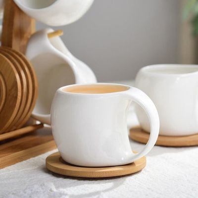 Stocked Six-Piece Ceramic Cup Set with 200 ml Capacity and Mug Coaster on Bamboo Stand
