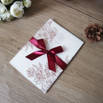 Vegetable Parchment Laser Cut Wedding Invitations with Rose Pattern and Heat Stamping