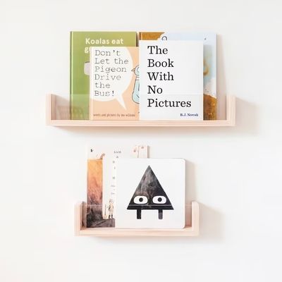 Save Space and Add Style to Your Kids' Nursery with Acrylic Floating Bookshelf Wall