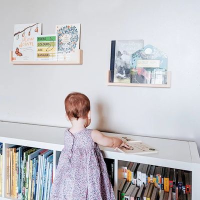 Save Space and Add Style to Your Kids' Nursery with Acrylic Floating Bookshelf Wall